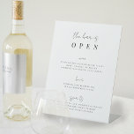 Minimal Script Wedding Bar Menu Pedestal Sign<br><div class="desc">Invite your guests to grab a favorite libation from the bar with our charming wedding bar menu sign. Design features "the bar is open" in crisp black calligraphy script and block lettering. Personalize with your drink selections beneath.</div>
