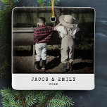 Minimal Vintage One Photo Personalized Christmas Ceramic Ornament<br><div class="desc">Capture the spirit of the season with our "Minimal Vintage One Photo" Personalized Christmas Ceramic Ornament. This ornament combines classic charm with a personalized touch, featuring your treasured family photo in a timeless typewriter-style frame. The one-photo design makes it a standout addition to your holiday decor. It's not just an...</div>