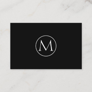Minimalist black business card with monogram