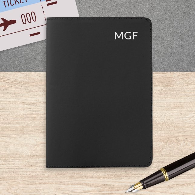 Minimalist Black Monogrammed Initial Custom Passport Holder (A sleek, black monogrammed passport cover in a modern, minimalist style)