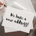 Minimalist Black White We Moved New Home Moving  Postcard<br><div class="desc">This modern minimalist we moved announcement postcard features fun brush lettering in black and white.</div>