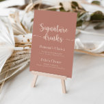 Minimalist Calligraphy Terracotta Signature Drinks Poster<br><div class="desc">This minimalist calligraphy terracotta signature drinks poster is perfect for a rustic wedding. The simple and elegant design features classic and fancy script typography. 

Personalize the sign with the names of the bride and groom and their favorite drink choice.</div>