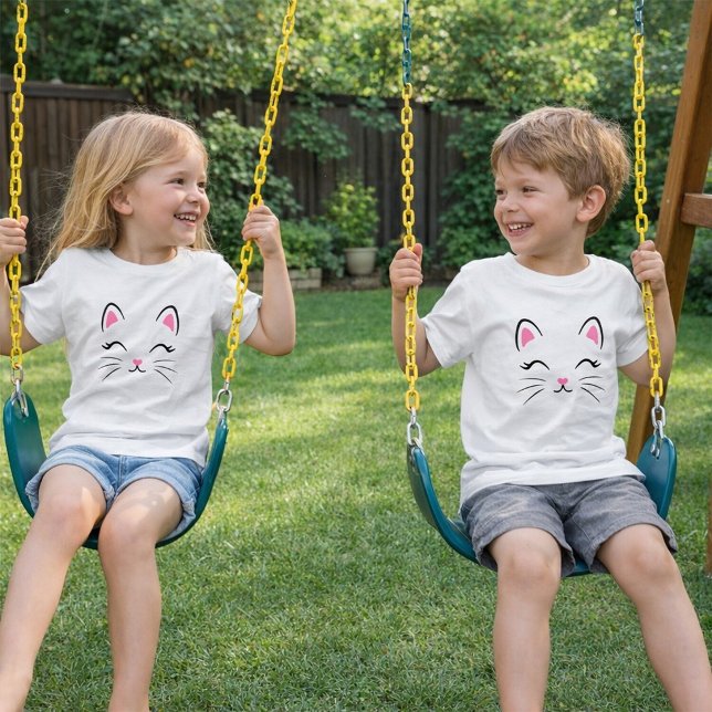 Minimalist Cute Cat Face T-Shirt  (“Swinging into smiles with our cute cat‑face tees.”)