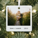 Minimalist First Christmas Married  PhotoNewlywed Metal Ornament<br><div class="desc">Minimalist style Christmas Ornament featuring a simple design with your favorite wedding photo along with your names and the year in a handwriting script.  The back has a second picture.  This modern and elegant holiday ornament makes a great gift for a newly engaged couple.</div>