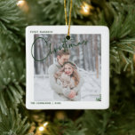 Minimalist First Married Christmas Script Photo Ceramic Ornament<br><div class="desc">Remember your first married Christmas forever with this modern,  minimalist holiday ornament,  featuring 'Christmas' in a rich,  traditional Christmas green hand lettered typography and your favorite wedding photo. The photo is repeated on the back,  with your wedding date details overlaid. Copyright Anastasia Surridge,  all rights reserved.</div>