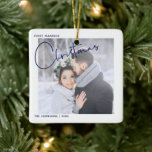 Minimalist First Married Christmas Script Photo Ceramic Ornament<br><div class="desc">Remember your first married Christmas forever with this modern,  minimalist holiday ornament,  featuring 'Christmas' in trendy,  modern blue hand lettered typography and your favorite wedding photo. The photo is repeated on the back,  with your wedding date details overlaid. Copyright Anastasia Surridge,  all rights reserved.</div>