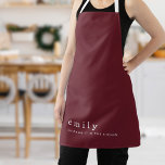 Minimalist Fun Quote Name Burgundy Christmas Apron<br><div class="desc">Minimalist Fun Quote Name Burgundy Christmas. Simple elegance with this fully customisable design. Easily personalise with your name and keep the festive themed quote Sleighing it in the Kitchen or change as required. The text,  background and straps can be changed to any colors of your choice.</div>