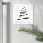 Minimalist Gold Black Artsy Tree Merry Christmas Magnet<br><div class="desc">Minimalist Gold Black Artsy Tree Merry Christmas is in a stylish set handwritten style script and a ribbon like simplistic tree illustration.</div>