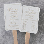 Minimalist Gold Wedding Program Hand Fan<br><div class="desc">This minimalist gold wedding program hand fan is perfect for a simple wedding. The modern romantic design features classic gold and white typography paired with a rustic yet elegant calligraphy with vintage hand lettered style. Customizable in any color. Keep the design simple and elegant, as is, or personalize it by...</div>