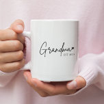 Minimalist Grandma EST 2025 Mug | New Grandma Gift<br><div class="desc">Celebrate a special moment with this elegant "Grandma♥ EST 2025" mug — the perfect gift for a newly promoted grandma! Featuring a clean, modern font and minimalist heart design, this mug is both stylish and meaningful. Ideal for pregnancy announcements, Mother’s Day surprises, or just a thoughtful keepsake. Personalize it if...</div>