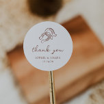 Minimalist Horseshoe | Brown and White Wedding Classic Round Sticker<br><div class="desc">These trendy yet elegant, brown and white wedding or bridal shower stickers feature a modern and minimalist rustic style, with handwritten script that says "thank you" as well as classic text. A hand-drawn pair of horseshoes is featured in a subtle illustration, for an updated look for your country, western or...</div>