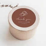 Minimalist Horseshoe | Rustic Brown Wedding Classic Round Sticker<br><div class="desc">These trendy yet elegant brown wedding or bridal shower stickers feature a modern and minimalist rustic style, with white handwritten script that says "thank you" as well as classic text. A hand-drawn pair of horseshoes is featured in a subtle illustration, for an updated look for your country, western or cowboy...</div>
