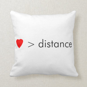 minimalist "love is greater than distance"  quote throw pillow