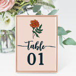 Minimalist Marigold Wedding Table Number<br><div class="desc">Elevate the aesthetics of your wedding decor with our minimalist table numbers featuring a graceful marigold flower and contemporary calligraphy. The striking glyphs add a touch of elegance and sophistication, while the swirling design effortlessly blends modernity with traditional charm. These table numbers are the perfect accessory to guide guests to...</div>