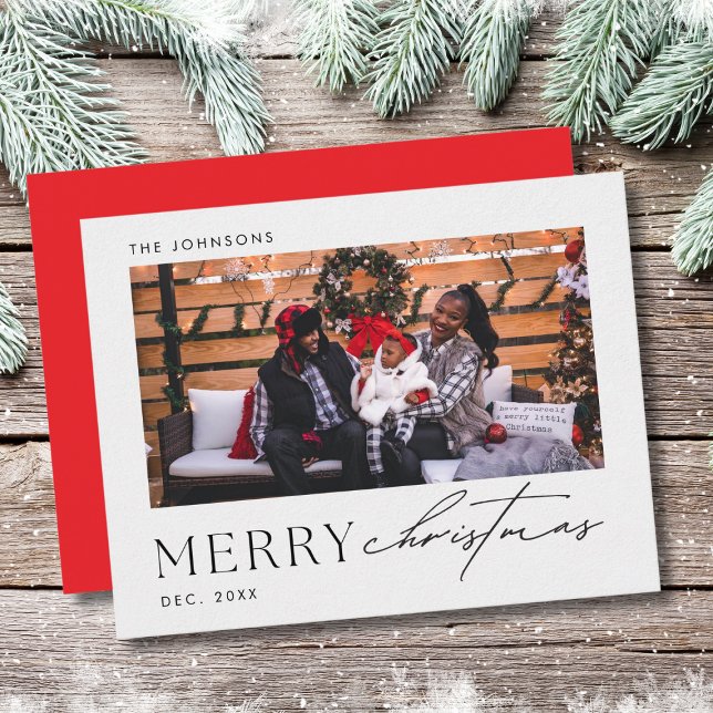 Minimalist Merry Christmas Family Photo Card (Family sitting on a couch in a festive outdoor setting, smiling for their Christmas photo card. )