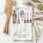 Minimalist Mistletoe Personalized Christmas Kitchen Towel<br><div class="desc">Add a touch of minimalist elegance to your kitchen this holiday season with this personalized Christmas kitchen towel. Featuring mistletoe and hanging utensils in a simple, rustic design, this towel is perfect for those who appreciate understated holiday decor. Personalize it with your name to make it a unique addition to...</div>