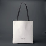 Minimalist Monogram Bridesmaid Tote Bag<br><div class="desc">A gift they’ll carry everywhere—literally. This ivory tote bag with a clean gray monogram is roomy enough for wedding-day essentials and chic enough for everyday errands. A personalized bridesmaid gift that’s as practical as it is beautiful.</div>