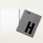 Minimalist Monogram Initial Grey Black Planner<br><div class="desc">Masculine Planner, with your choice of initial and editable year. This minimalist design features oversized sans serif typography in black on a grey background. The template is set up for you to change the letter and edit the year. If you wish to edit the colors as well, please click "customize...</div>