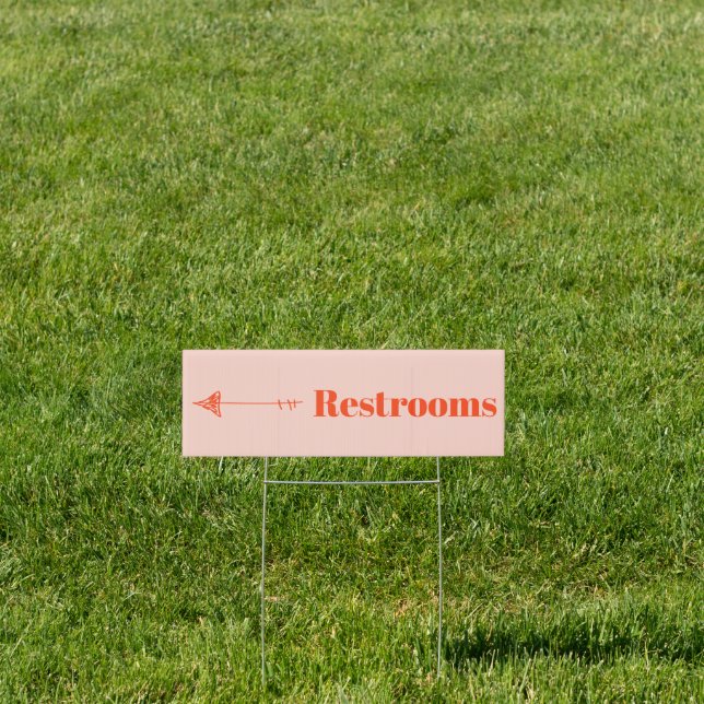 Minimalist Orange Pink Arrow Direction Restrooms Sign (Insitu)