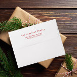 minimalist red & white typewriter text christmas envelope<br><div class="desc">Minimalist red and white typewriter text envelopes.  All text can be customized with your family name and address information.  Perfect for christmas holiday cards or any time of year.</div>