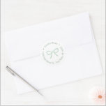 Minimalist Sage Green Bow Christmas Return Address Classic Round Sticker<br><div class="desc">This simple and flexible sticker design features a single sage green bow (you can actually change the color of the bow inside the design tool) with circular text in a darker co-ordinating shade of green. Shown here for a return address label but all of the text fields are flexible to...</div>
