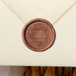 Minimalist Typography Merry Christmas Family Name Wax Seal Stamp<br><div class="desc">A simple and elegant wax stamper with "merry christmas" or another greeting of your choice and your family name. The two sections are separated with a minimal horizontal line divider. Before using the seal on your cards and gifts, we highly recommend practicing on spare paper first to get a feel...</div>