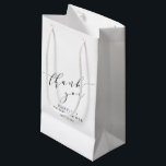 Minimalist White Black Bridal Shower Thank You Small Gift Bag<br><div class="desc">Make your bridal shower or special event extra memorable with this stylish personalized gift bag. Featuring a minimalist "thank you" in elegant script, this design blends modern sophistication with timeless charm. Perfect for bridal party gifts, wedding favors, or special thank-you treats, this customizable bag adds a thoughtful touch to any...</div>