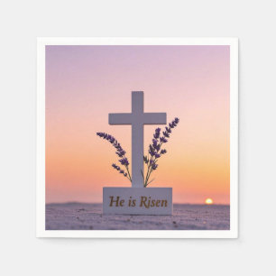 Minimalist white cross adorned with lavender napkins