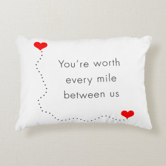 minimalist "you're worth every mile between us" decorative pillow