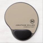 Minimalistic Modern Monogram Gel Mouse Pad<br><div class="desc">This minimalistic and modern gel mouse pad is the perfect addition to any office or workspace. The sleek design features a monogram in classic block typography, adding a touch of personalization, on a beige background. The gel wrist rest provides comfort and support during long hours of work. The non-slip base...</div>