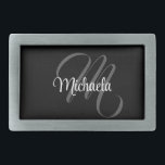 Minimalistic modern monogram initial name belt buckle<br><div class="desc">Minimalistic modern monogram initial name black white. Personalizable custom name with a cursive initial behind on a black color.</div>