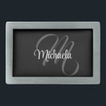 Minimalistic modern monogram initial name belt buckle<br><div class="desc">Minimalistic modern monogram initial name black white. Personalizable custom name with a cursive initial behind on a black color.</div>
