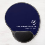 Minimalistic Modern Monogram Navy Blue Gel Mouse Pad<br><div class="desc">This minimalistic and modern gel mouse pad is the perfect addition to any office or workspace. The sleek design features a monogram in classic block typography, adding a touch of personalization, on a navy blue background. The gel wrist rest provides comfort and support during long hours of work. The non-slip...</div>