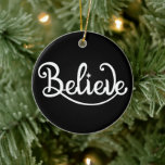 Minimalistic Modern Stylish Personalized Christmas Ceramic Ornament<br><div class="desc">Embrace the enchantment of the holiday season with our Minimalistic Modern Stylish Personalized Christmas Ceramic Ornament. This ornament is the perfect addition to your tree, capturing the essence of Christmas in a sleek and contemporary design. Featuring a black and white color scheme and adorned with Santa Claus and reindeer, this...</div>