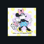 Minnie Live Life in Polka Dots Canvas Print<br><div class="desc">Bright, bold, and full of fashionable fun, this cheerful artwork features Minnie Mouse stepping out in style with her signature bow, polka dot skirt, and coordinating shopping bag. Set against a lively polka dot background with an uplifting message, this design celebrates confidence, joy, and classic Minnie flair. Perfect for customizable...</div>