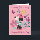 Minnie Mouse & Flowers - Happy Mother's Day Card<br><div class="desc">Celebrate the special moms in your life with this Minnie Mouse & Flowers Happy Mother's Day card! This delightful design features Minnie Mouse dressed in her signature polka-dot bow and heels, standing amidst a beautiful garden of vibrant flowers in pink, yellow, and purple hues. A cheerful butterfly flutters nearby, adding...</div>