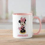 Minnie Mouse | Posing in Pink Mug<br><div class="desc">This cute graphic features Minnie Mouse posing in a pink dress and bow.</div>