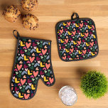 Mint Green Blush Pink Blue Hearts Art Pattern Oven Mitt & Pot Holder Set<br><div class="desc">Explore a sleek, modern oven mitt and pot holder set that features a playful and appealing design, showcasing a contemporary pattern of pastel blush pink, light and dark blue, coral orange, mint green, and yellow Valentine love hearts on a black backdrop. This set represents a fusion of elegance, style, and...</div>