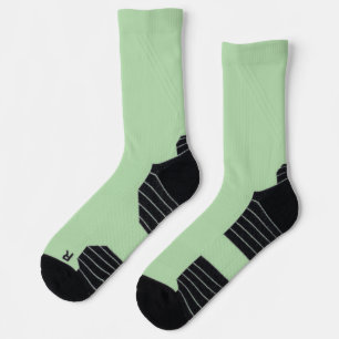 mint-green crew socks with black toe and heel 