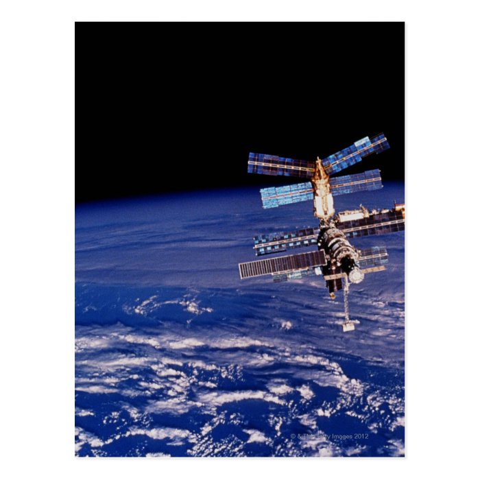 Mir Space Station floating above the Earth Post Cards