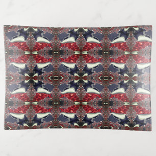 Mirror image generating repeated shape, over white trinket tray