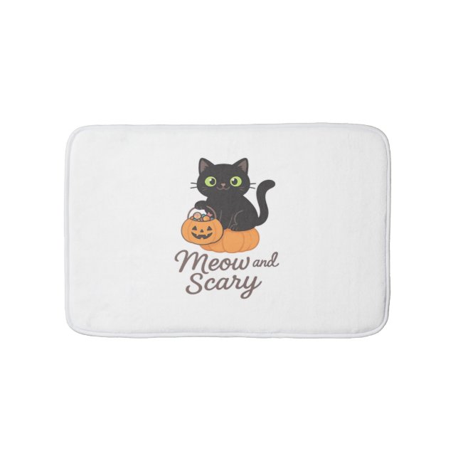 Mischievous Black Cat with Glowing Green Eyes on P Bath Mat (Front)
