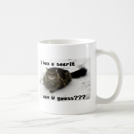 Mischievous Maine Coon in the snow Coffee Mug