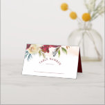 Mistletoe Manor Chic Seating Wedding Table Number Place Card<br><div class="desc">Mistletoe Manor Watercolor Lush Winter Roses Design with Hand Painted Florals, Holly Berry Leaves, Pine Sprig Foliage, and Watercolor Paint Brush Strokes. Colorful Marsala, Wine Merlot Red, Burgundy, Ivory Cream, and Green. With Swirly Chic Typography Brush Script Fonts, and Elegant floral Border - Wedding Reception Guest Seating Table Number Place...</div>