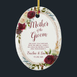Mistletoe Manor To the Mother of the Groom Quote Ceramic Ornament<br><div class="desc">Mistletoe Manor Watercolor Lush Roses Design with Hand Painted Florals, Holly Berry Leaves, Pine Sprig Foliage, and Watercolor Paint Brush Strokes. Colorful Marsala, Wine Merlot Red, Burgundy, Ivory Cream, and Green. With Swirly Chic Typography Brush Script Fonts and Rose Gold Elegant Floral Oval Frame - Mother of the Groom Heartfelt...</div>