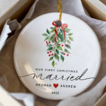 Mistletoe Married First Christmas Ceramic Ornament<br><div class="desc">Celebrate your first Christmas together as a married couple with our exquisite Christmas ornament featuring a charming green mistletoe with red ribbon bow design. Perfect for newlyweds,  it adds a personal touch to your holiday decor while creating lasting memories for years to come.</div>