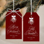 Mistletoe Merry Christmas | Feliz Navidad Red  Gift Tags<br><div class="desc">This holiday gift tag features elegant,  romantic swirly calligraphy with a winter mistletoe bouquet and a festive 'Merry Christmas' on the front,  along with 'Feliz Navidad' script on the back. For more advanced customization of this design,  please click the BLUE DESIGN TOOL BUTTON above!</div>