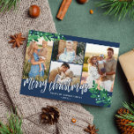 Mistletoe Twigs Navy Photo Collage Merry Christmas Holiday Card<br><div class="desc">Photo Christmas card with a photo collage with four photos and pretty mistletoe twigs in green and pale blue. Merry Christmas is written in a white, charming calligraphy script. Add your family name and the year in an elegant white font against a navy blue background. The back features a matching...</div>
