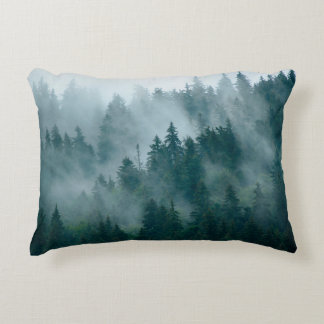 Misty landscape with fir forest in hipster vintage accent pillow