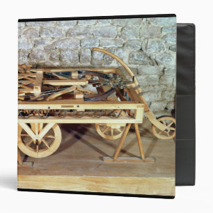 Model of a car driven by springs 3 ring binder